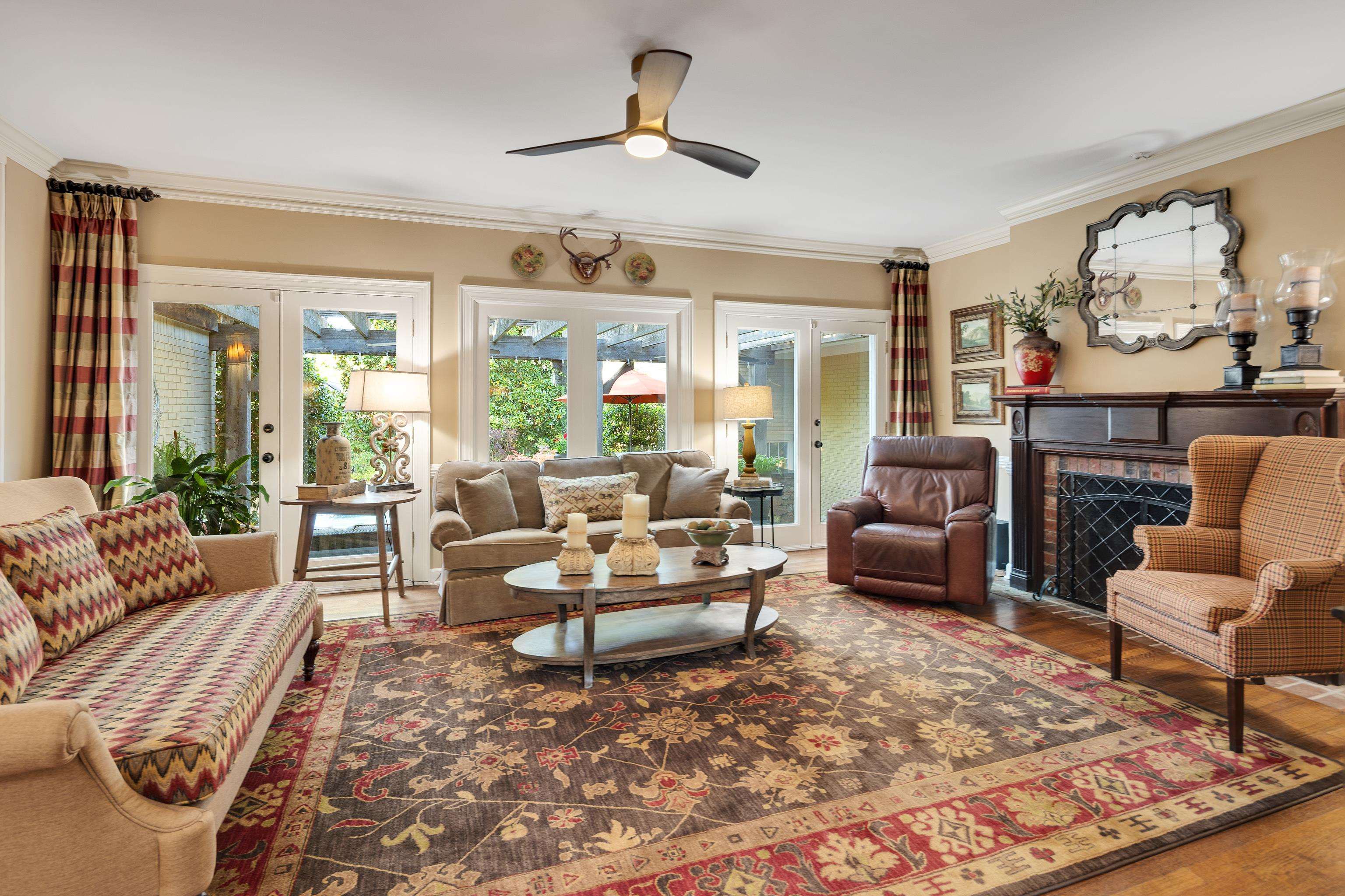 6326 East Shady Grove Road Memphis, TN 38120 - Photo 10 of 40 a living room with furniture and a large window