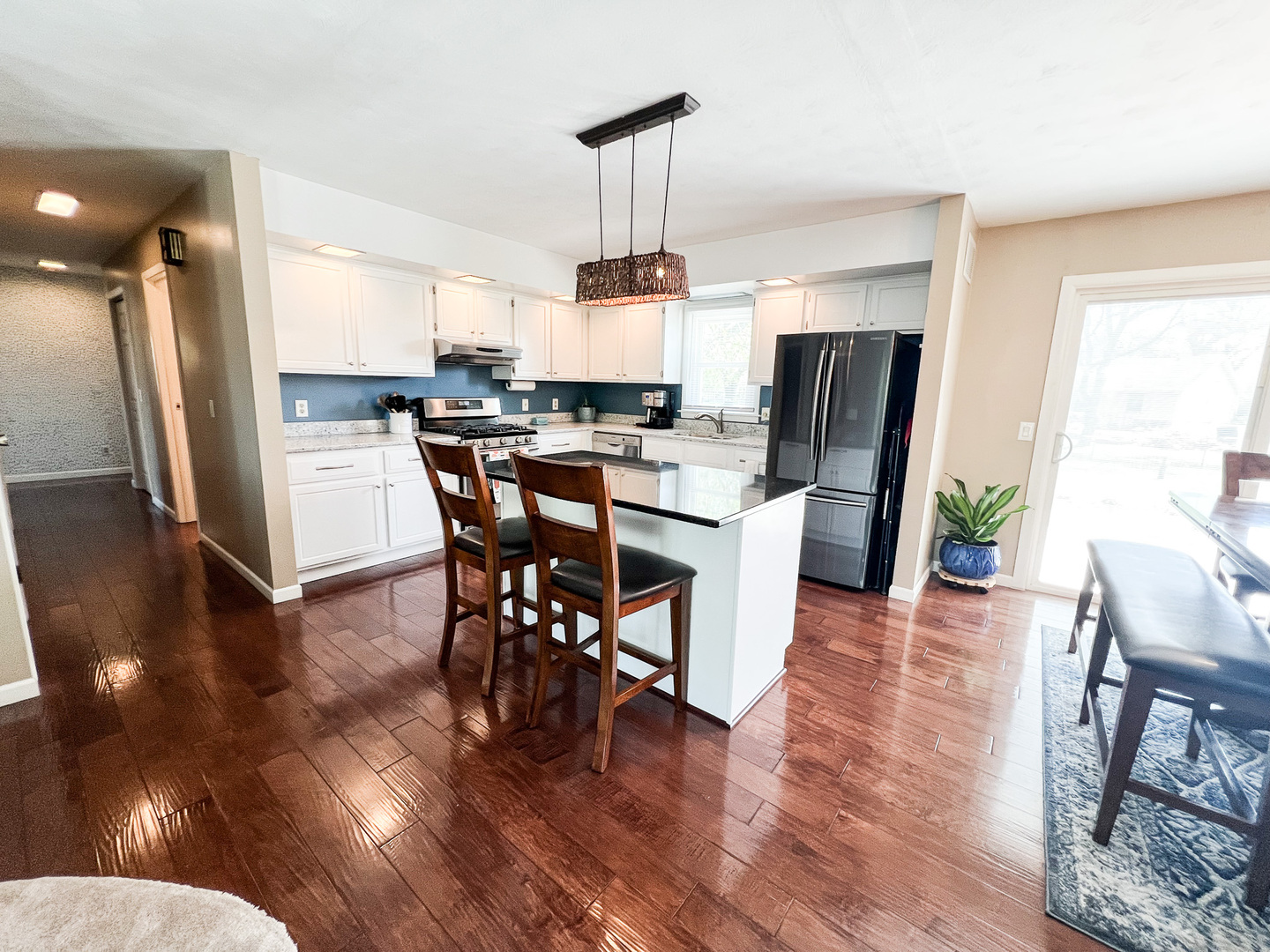 2201 Oak Drive Eureka, IL 61530 - Photo 17 of 25 a view of a dining room with furniture window and wooden floor