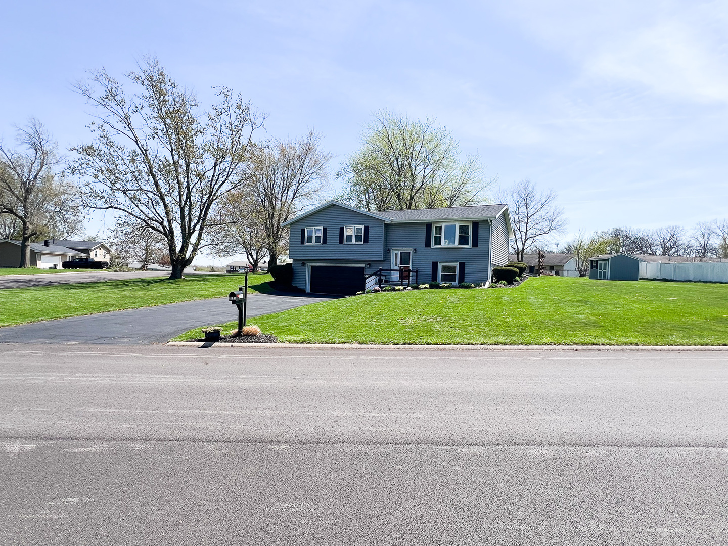 2201 Oak Drive Eureka, IL 61530 - Photo 25 of 25 a view of building with a garden and trees