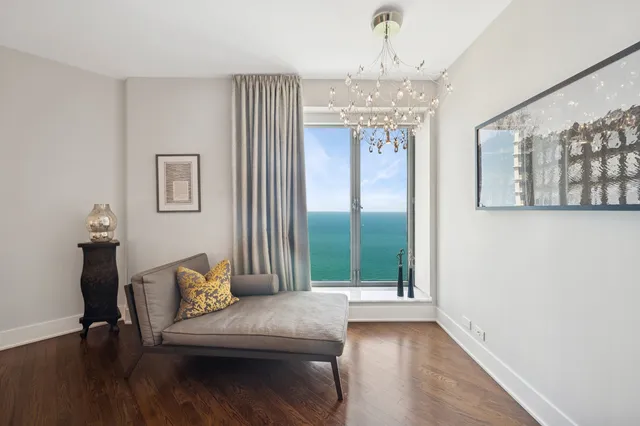 a view of a livingroom with furniture and window