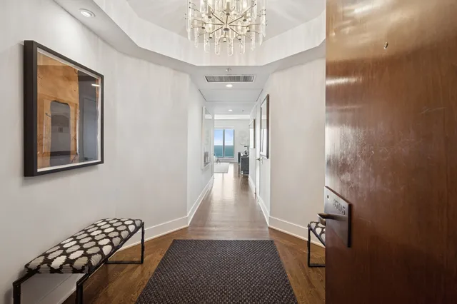 a view of entryway with livingroom