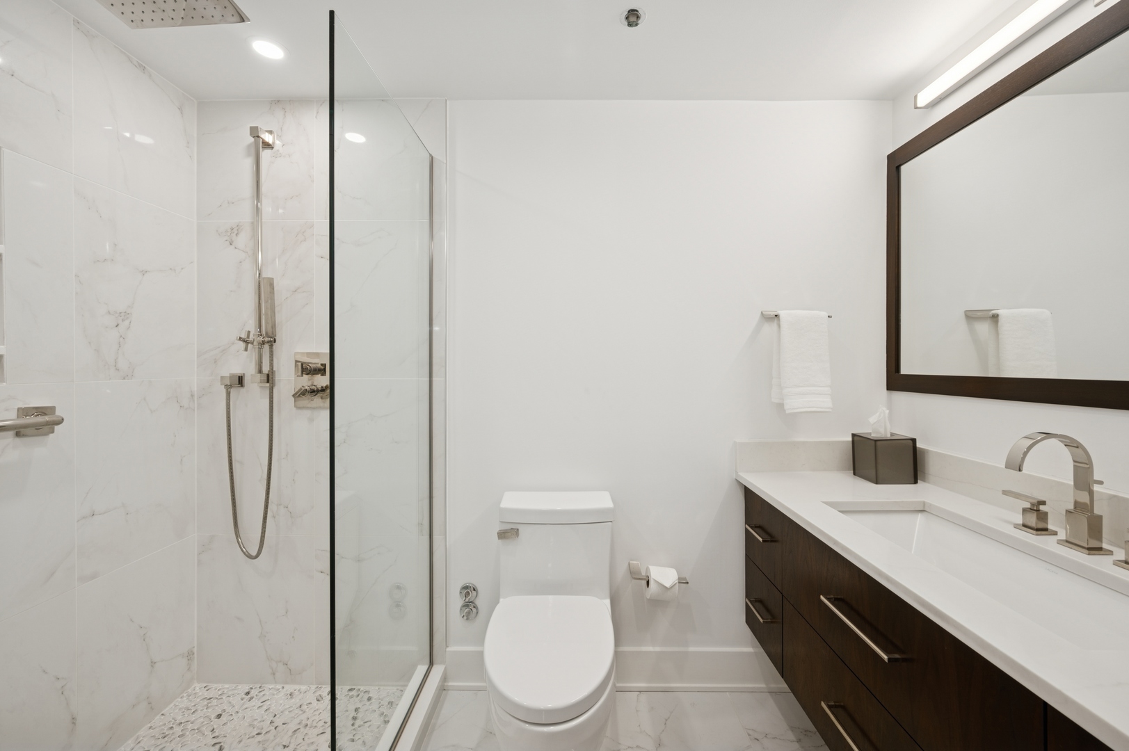 950 North Michigan Avenue, Unit 3705 Chicago, IL 60611 - Photo 23 of 47 a bathroom with a toilet sink shower and mirror