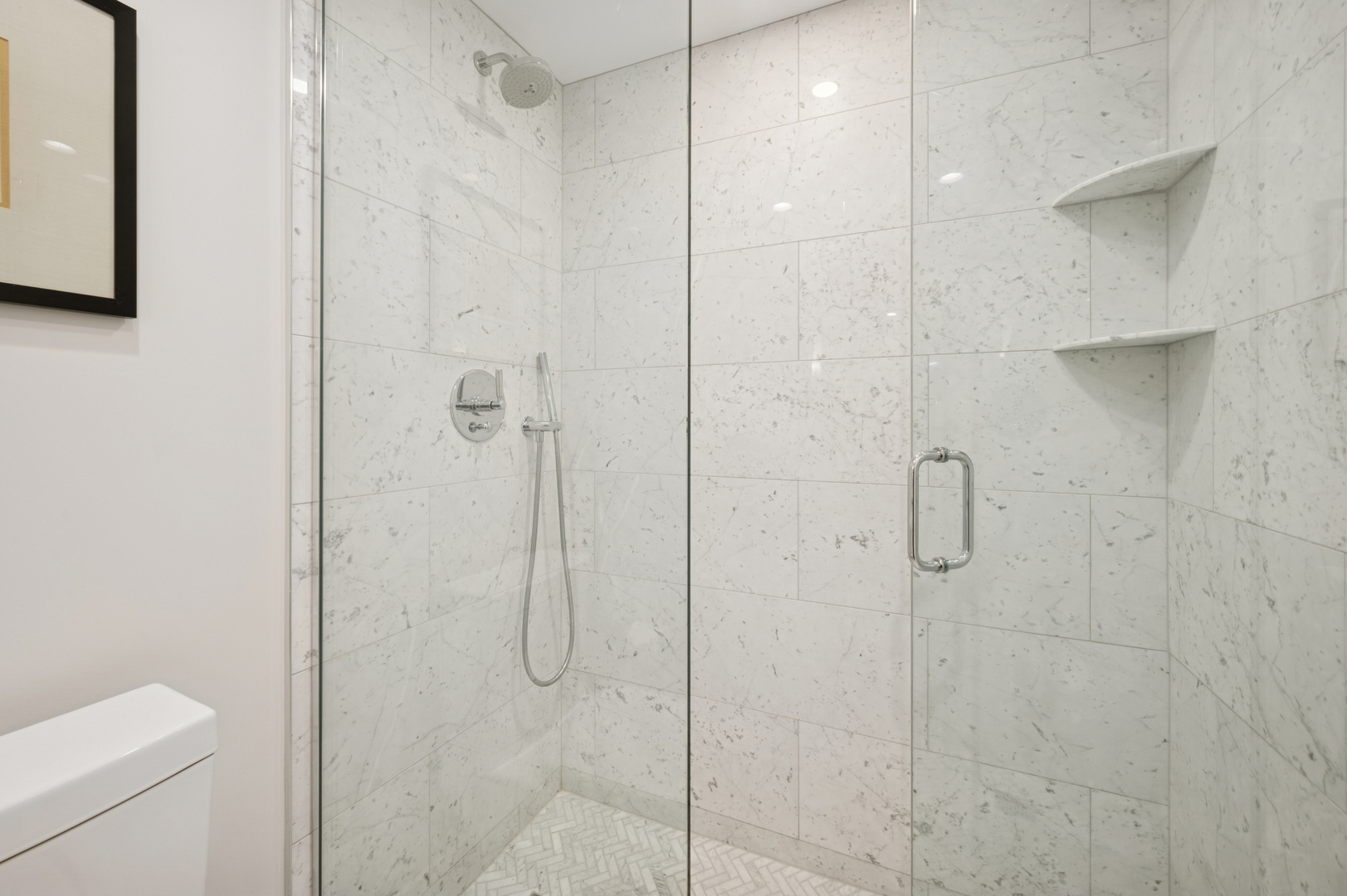 950 North Michigan Avenue, Unit 3705 Chicago, IL 60611 - Photo 30 of 47 a bathroom with a shower and toilet