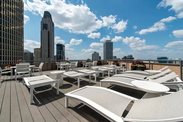 a view of a terrace with furniture