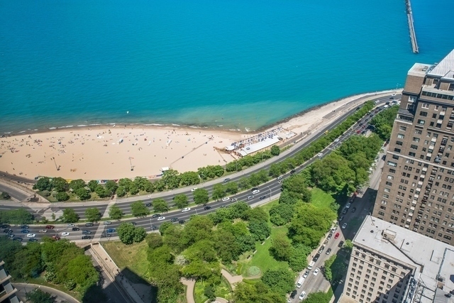 950 North Michigan Avenue, Unit 3705 Chicago, IL 60611 - Photo 5 of 47 a view of a yard with an outdoor space