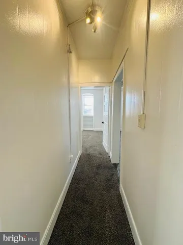 an empty room with a empty space and window