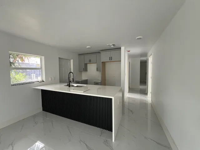 a house view with a garden space