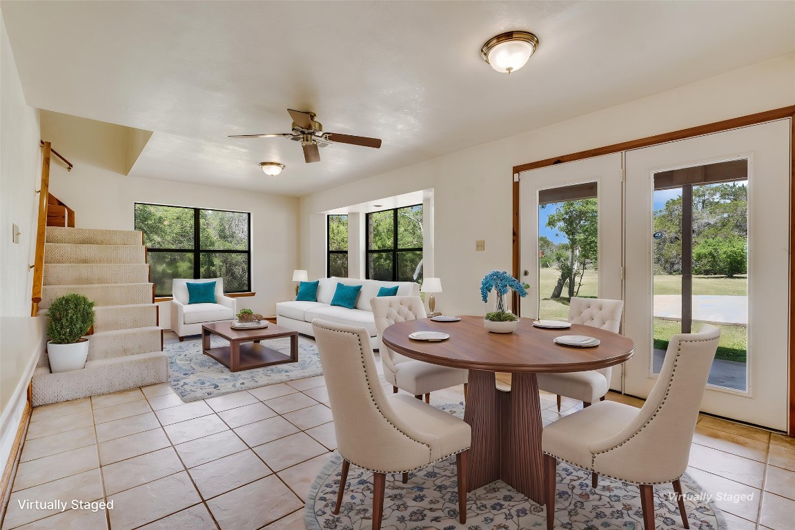 199 Middleton Road Spicewood, TX 78669 - Photo 9 of 39 a view of a dining room with furniture window and outside view