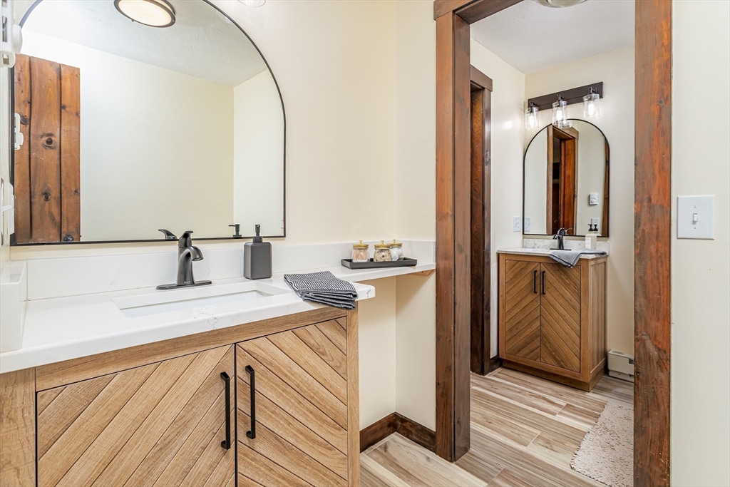 5 Kurikka Road Westminster, MA 01473 - Photo 23 of 38 a en suite bathroom with a sink and mirror