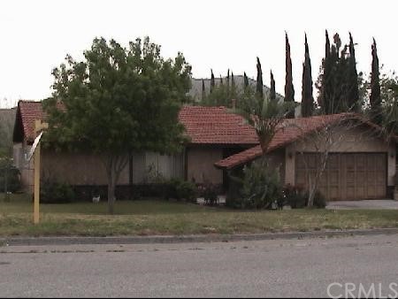2140 Gail Drive, Unit 1 Riverside, CA 92509 - Photo 1 of 1 a front view of a house with a yard