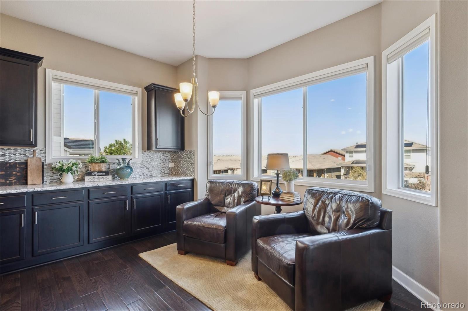 14100 Sierra Ridge Circle Parker, CO 80134 - Photo 12 of 37 a living room with furniture and a large window