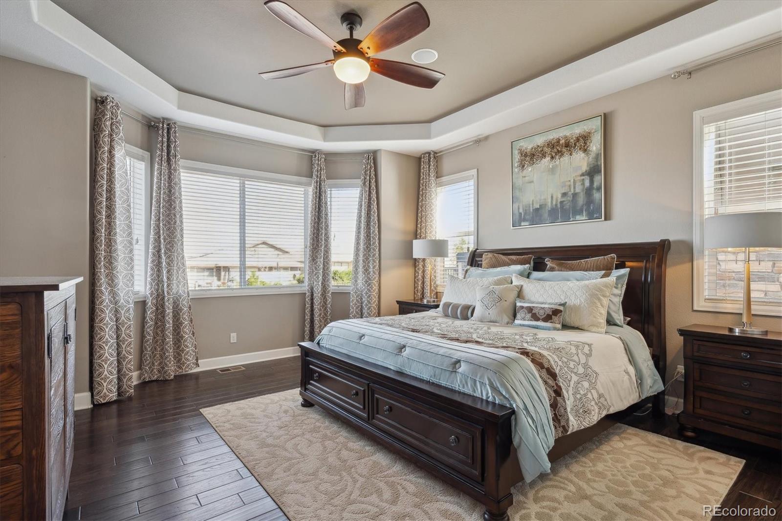 14100 Sierra Ridge Circle Parker, CO 80134 - Photo 14 of 37 a bedroom with a bed and a window