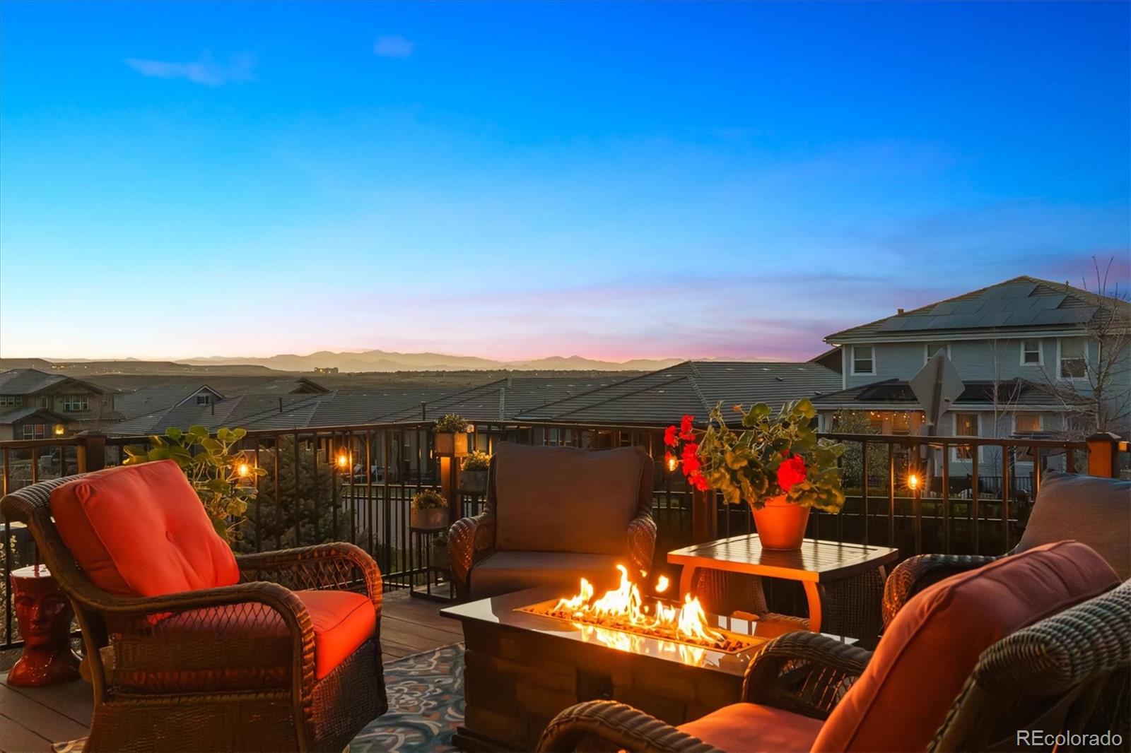 14100 Sierra Ridge Circle Parker, CO 80134 - Photo 2 of 37 a view of a terrace with couches chairs
