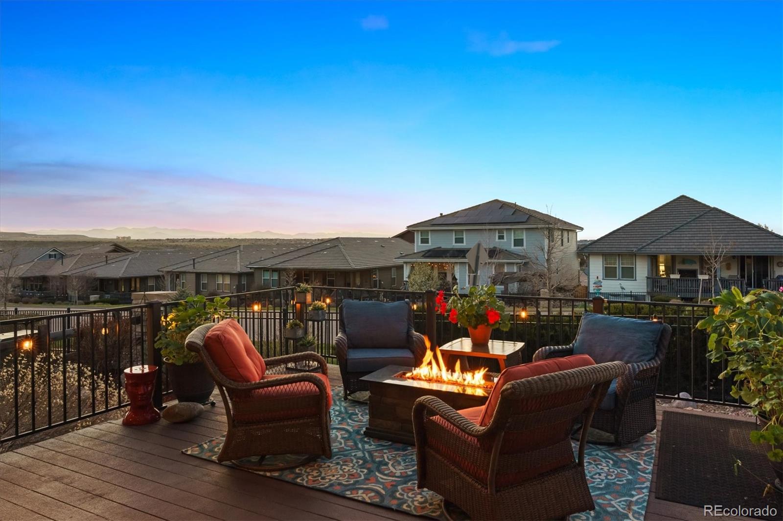 14100 Sierra Ridge Circle Parker, CO 80134 - Photo 32 of 37 a outdoor living space with furniture and city view