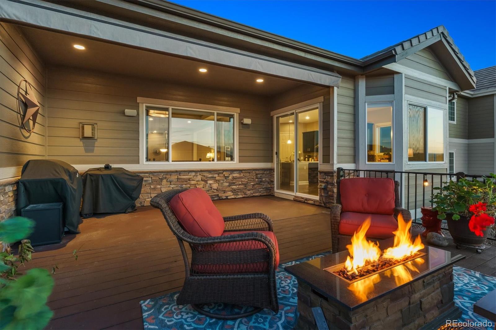 14100 Sierra Ridge Circle Parker, CO 80134 - Photo 34 of 37 a living room with furniture