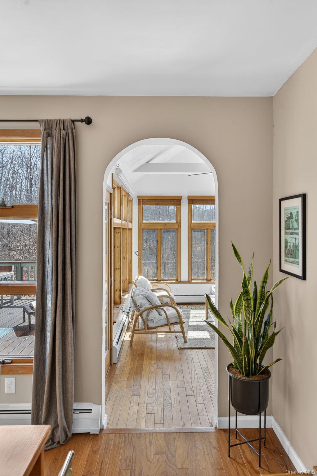 197 Hardenburgh Road Ulster Park, NY 12487 - Photo 14 of 35 a living room with furniture and a large window