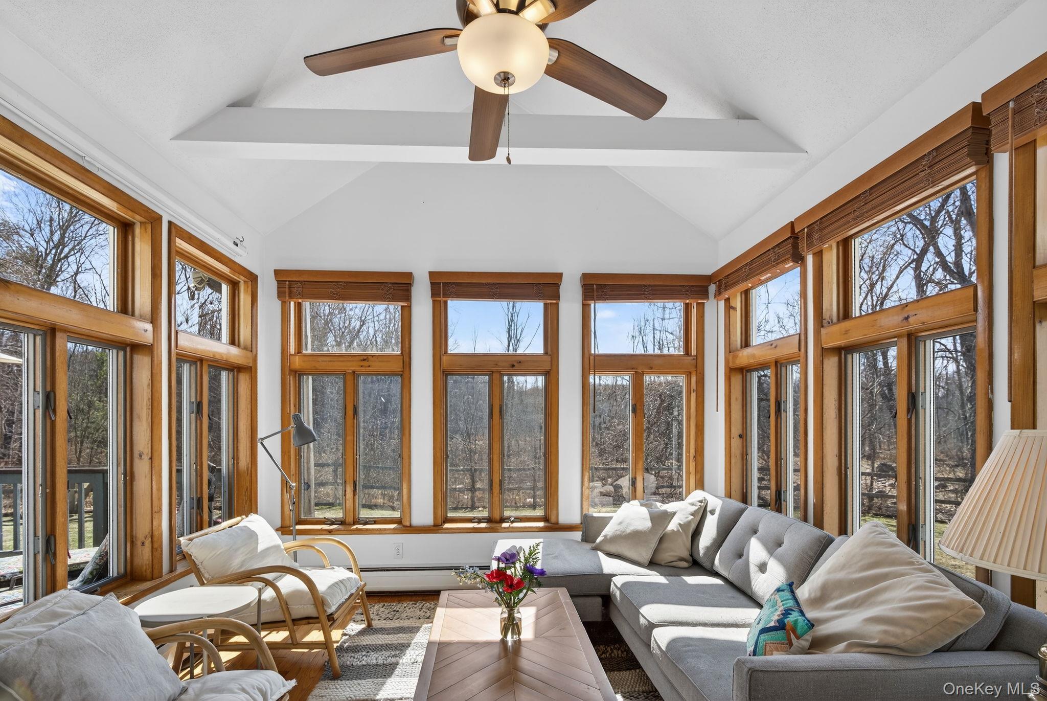 197 Hardenburgh Road Ulster Park, NY 12487 - Photo 15 of 35 a living room with furniture and a large window