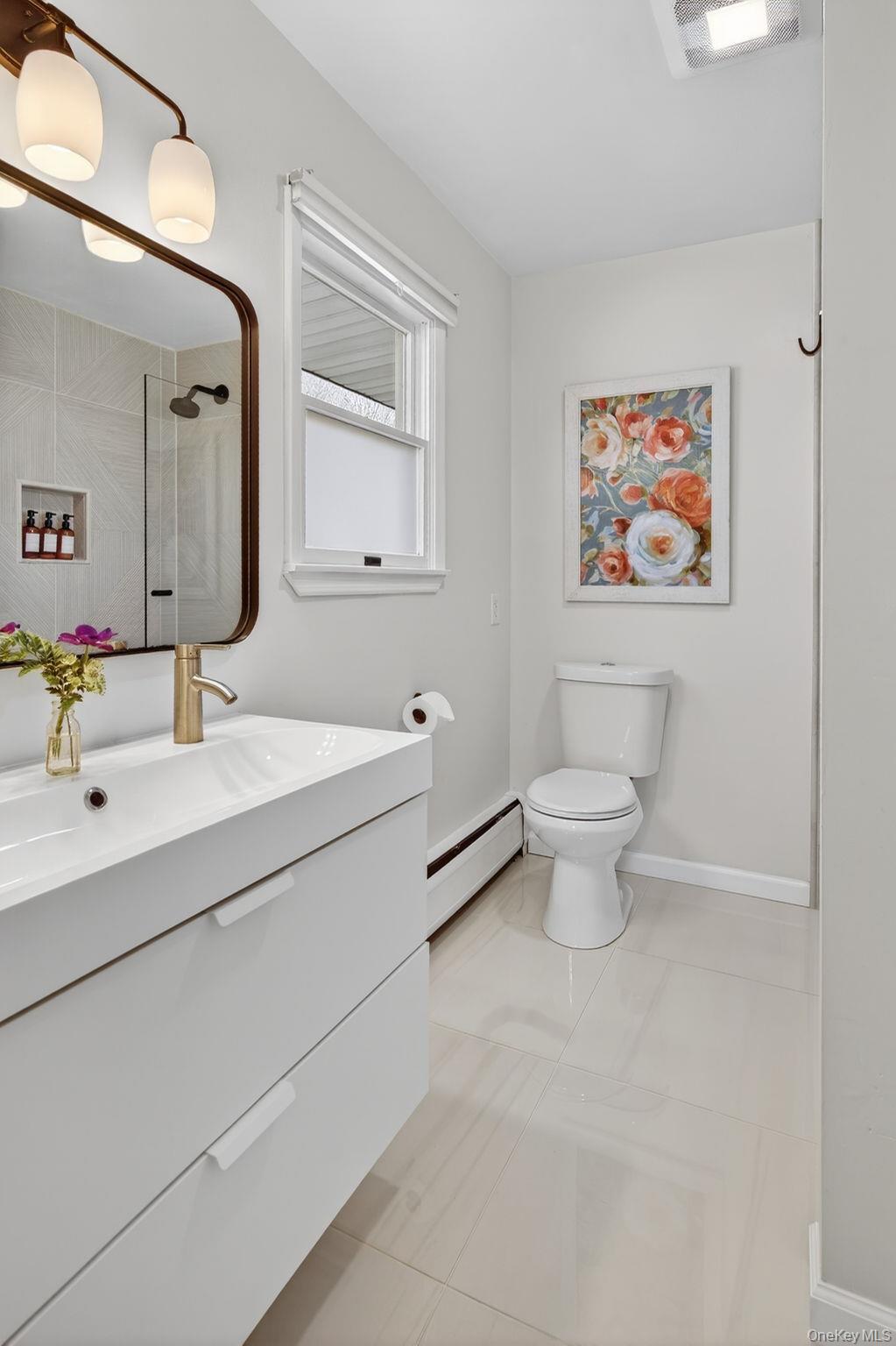 197 Hardenburgh Road Ulster Park, NY 12487 - Photo 25 of 35 a bathroom with a toilet sink and mirror