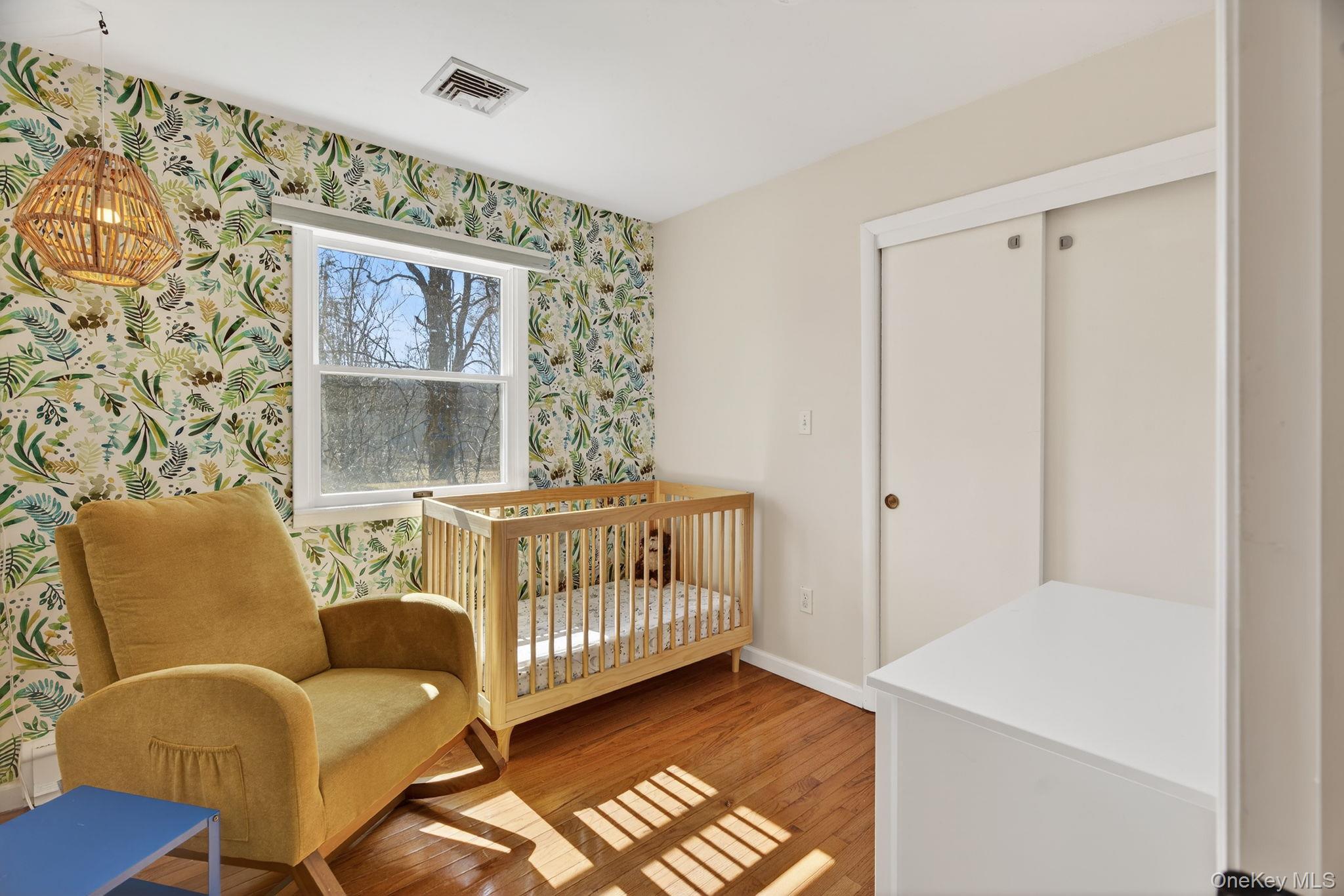 197 Hardenburgh Road Ulster Park, NY 12487 - Photo 29 of 35 a bedroom with furniture and a window