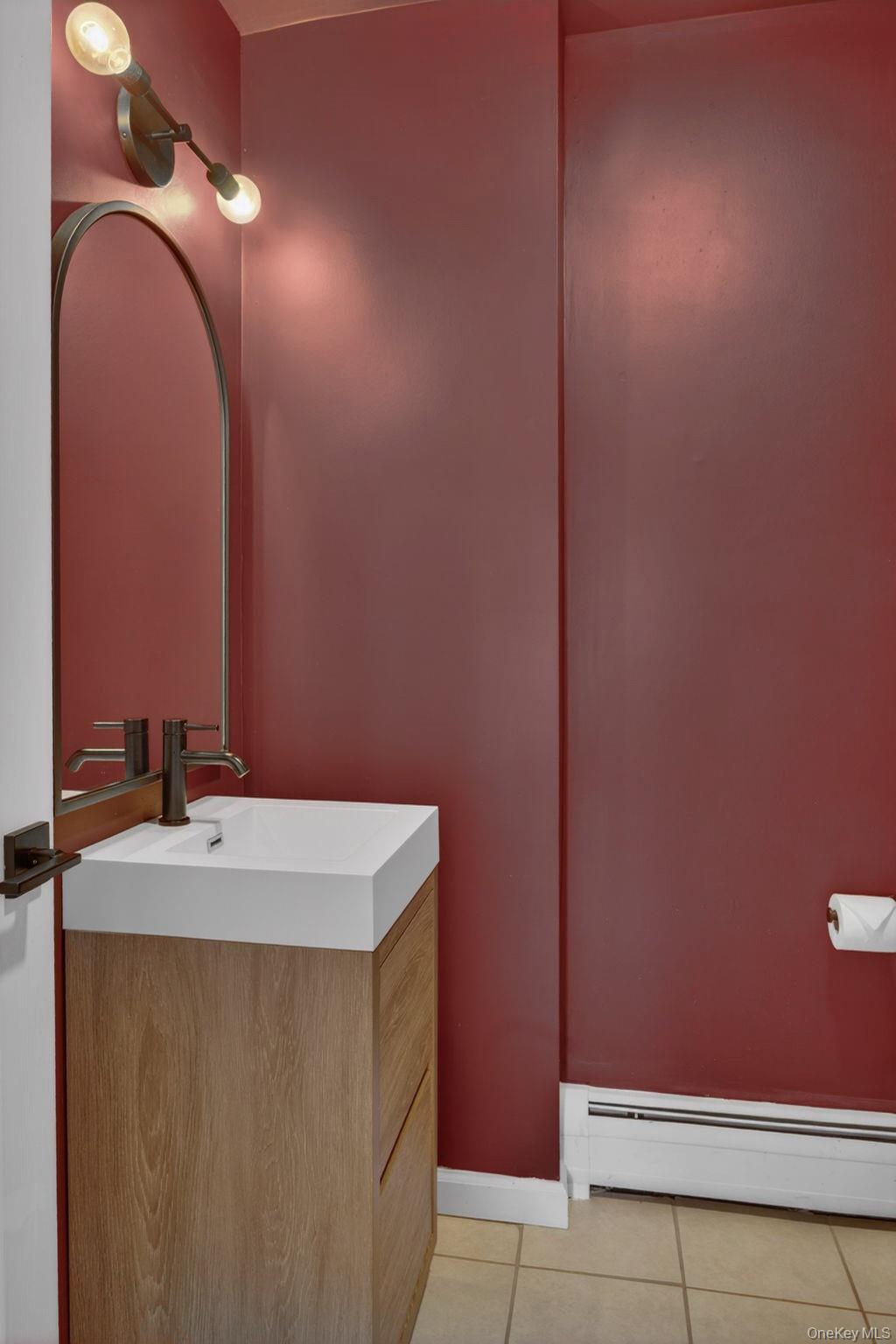 197 Hardenburgh Road Ulster Park, NY 12487 - Photo 31 of 35 a bathroom with a sink and a mirror