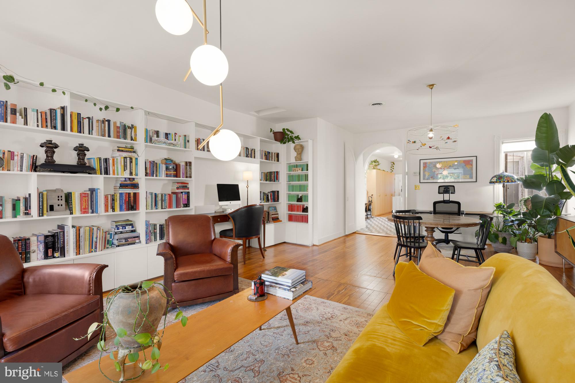 3022 R Street Northwest, Unit 3 Washington, DC 20007 - Photo 14 of 22 a living room with furniture and a book shelf