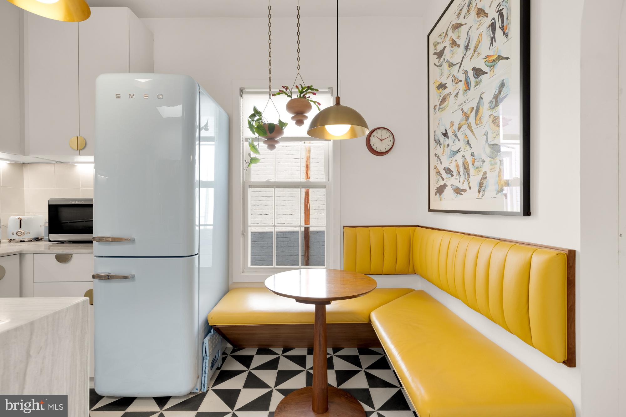 3022 R Street Northwest, Unit 3 Washington, DC 20007 - Photo 6 of 22 a living room with furniture and a chandelier