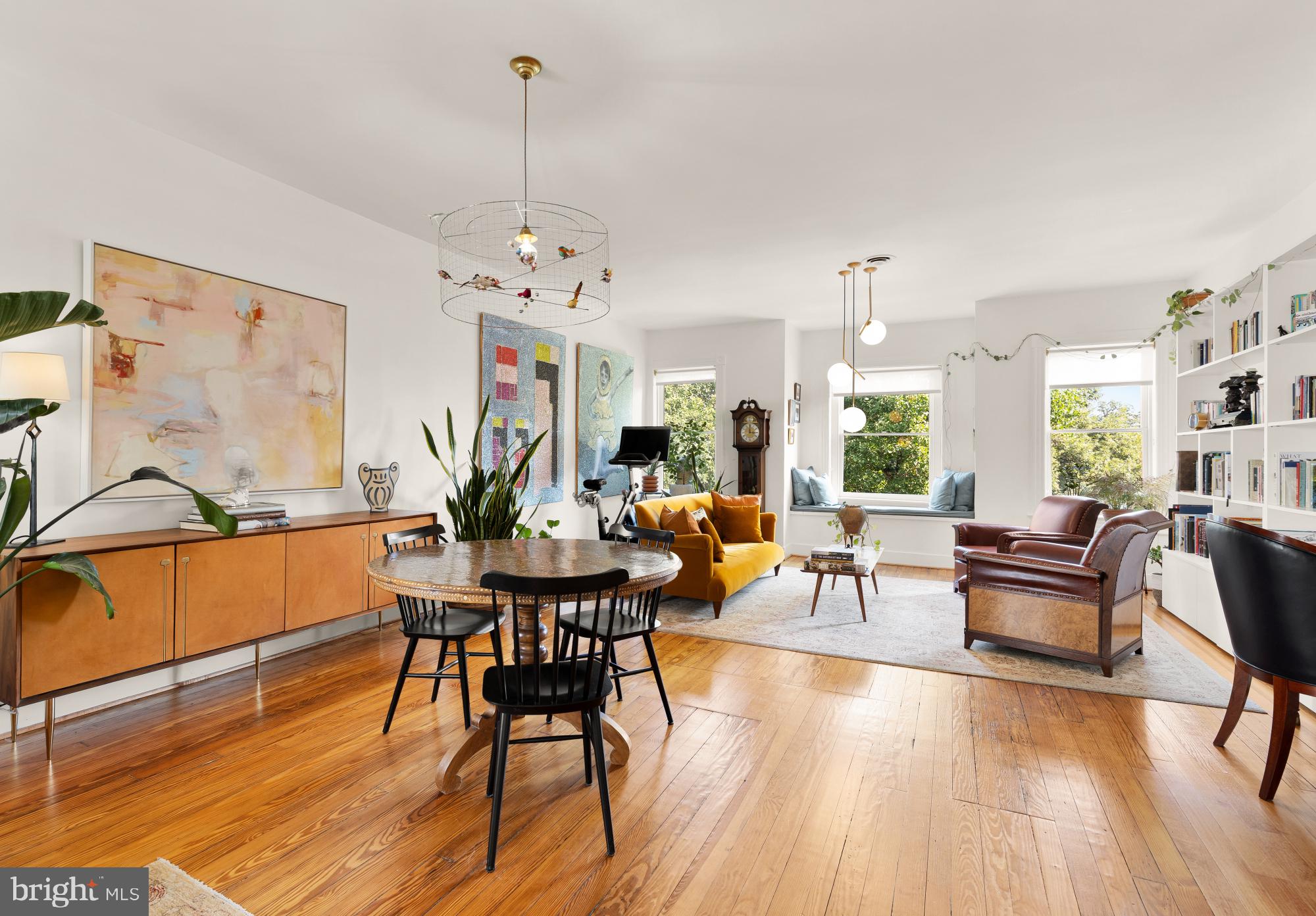 3022 R Street Northwest, Unit 3 Washington, DC 20007 - Photo 8 of 22 a living room with furniture dining table and a chandelier