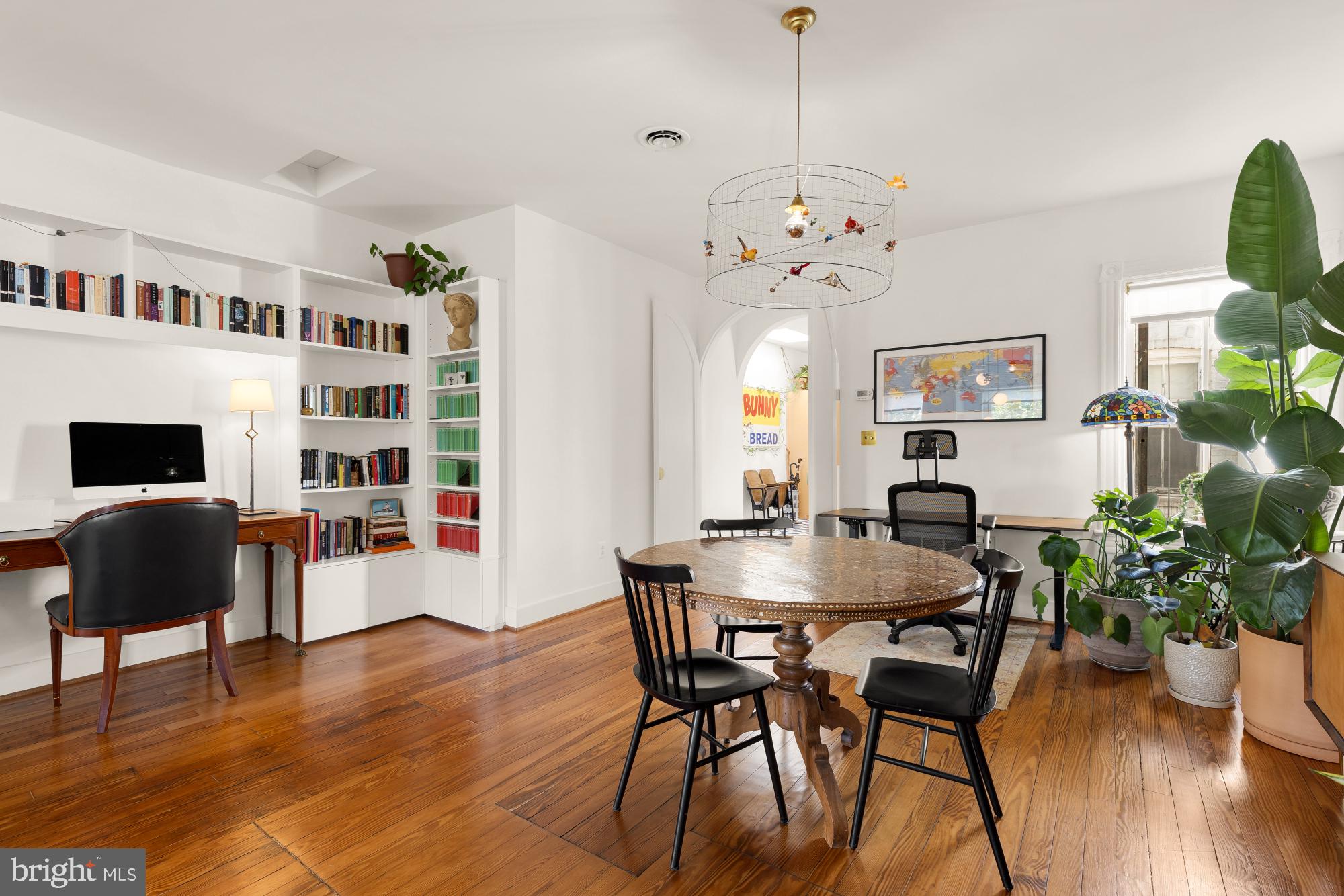 3022 R Street Northwest, Unit 3 Washington, DC 20007 - Photo 10 of 22 a view of a dining room with furniture and wooden floor