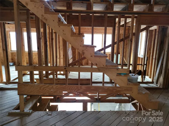 a view of a house with porch and wooden floor