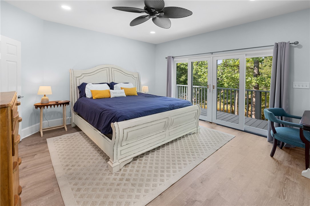 206 Petty Road Seneca, SC 29672 - Photo 18 of 47 A private balcony offers serene outdoor access directly from this inviting sleeping space.