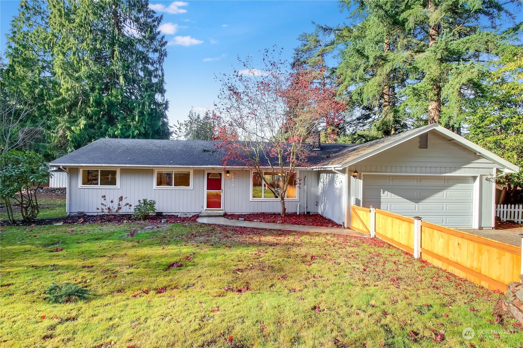 19818 34th Drive Southeast Bothell, WA 98012 - Photo 1 of 34 a front view of a house with a yard