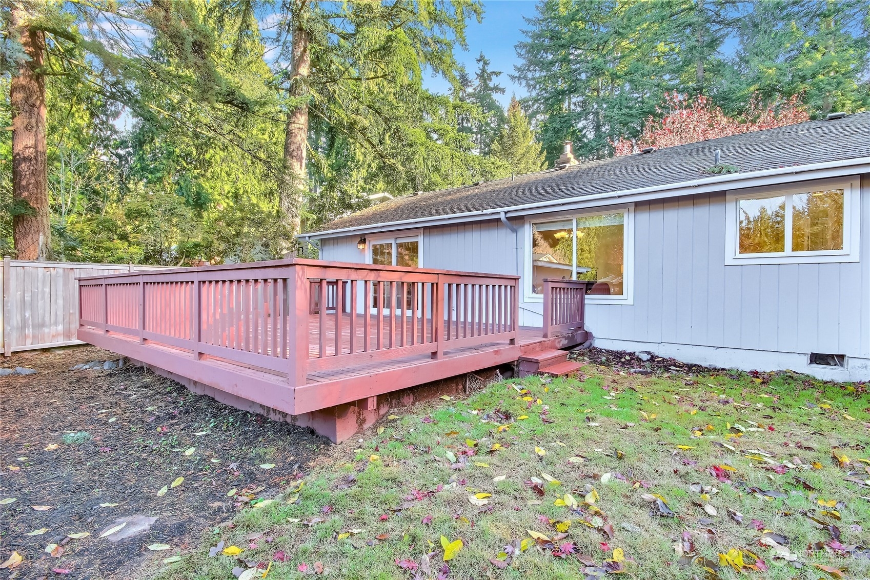 19818 34th Drive Southeast Bothell, WA 98012 - Photo 26 of 34 a view of a backyard with wooden fence and a small yard