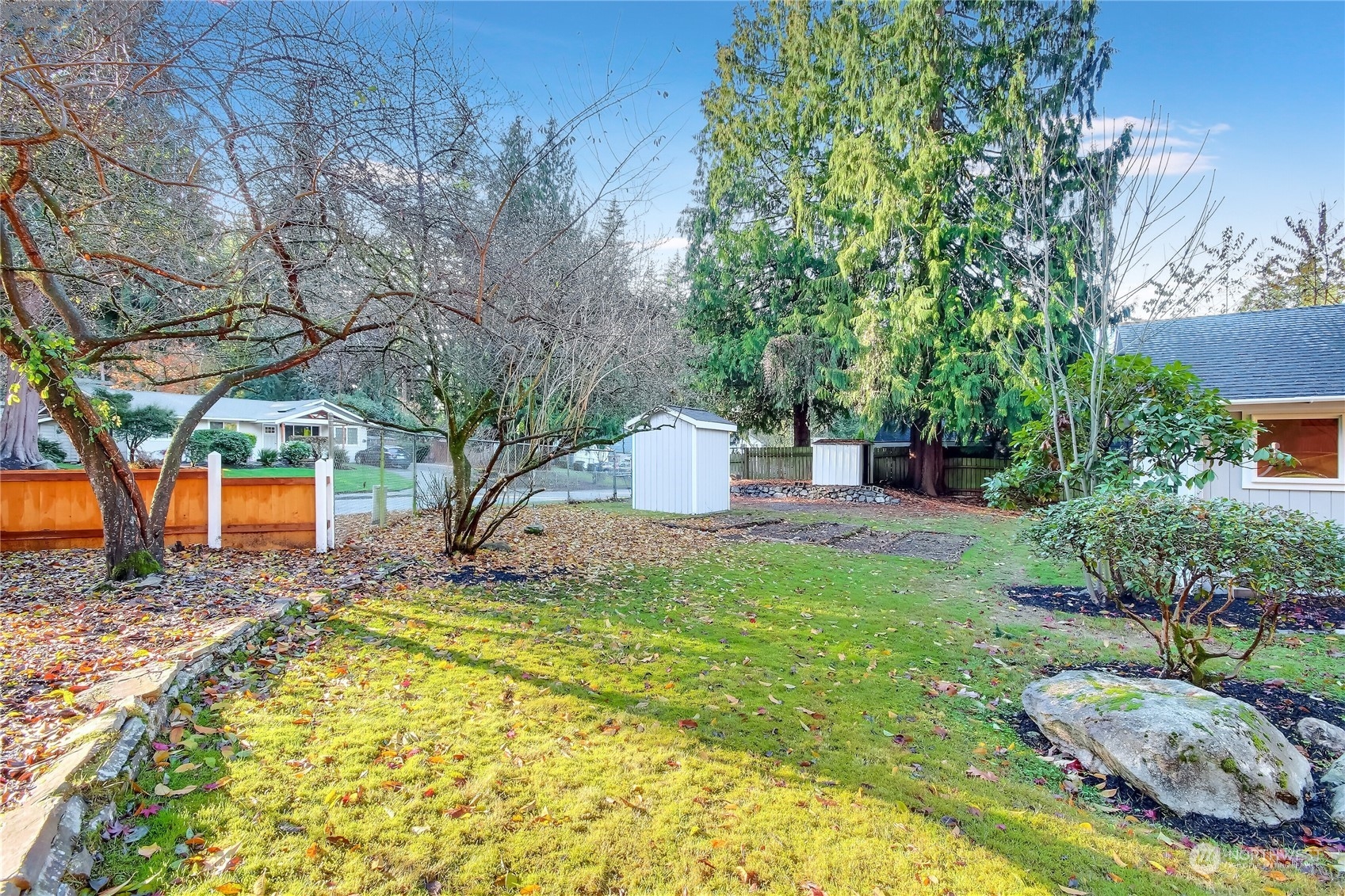 19818 34th Drive Southeast Bothell, WA 98012 - Photo 30 of 34 a backyard of a house with yard and outdoor seating