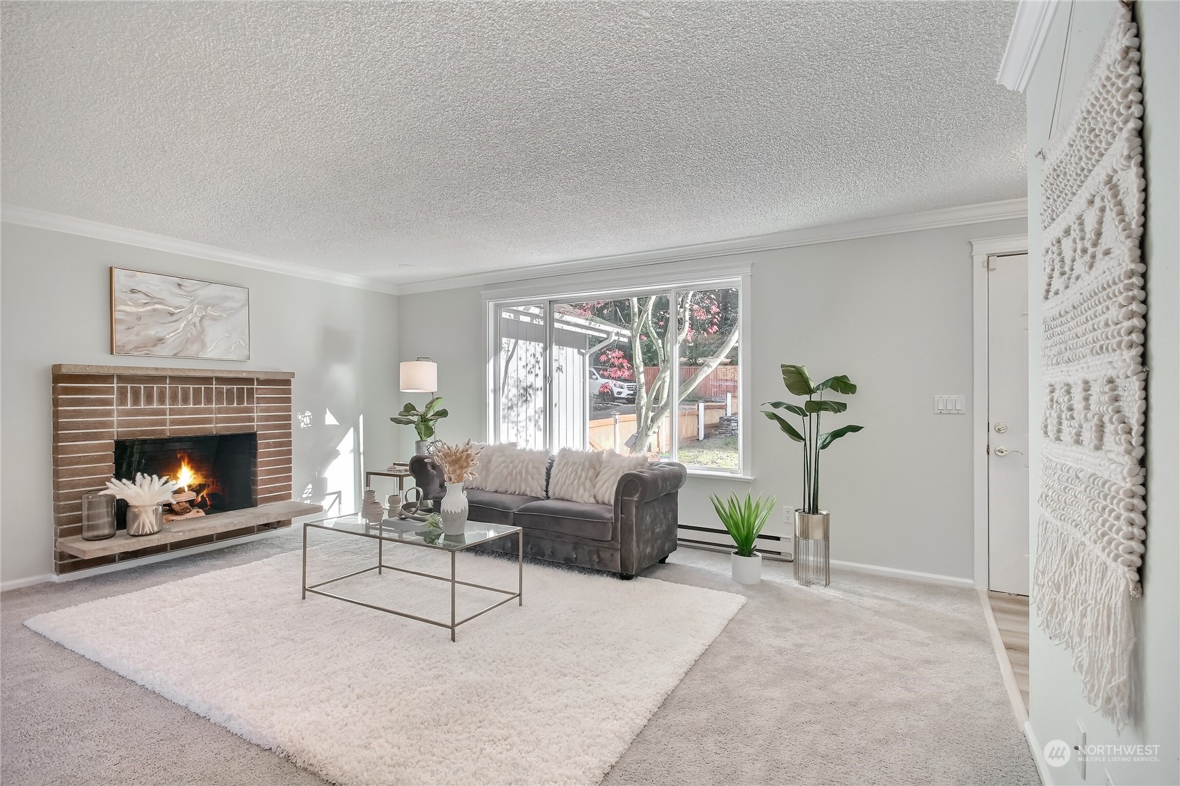 19818 34th Drive Southeast Bothell, WA 98012 - Photo 6 of 34 a living room with furniture and a fireplace