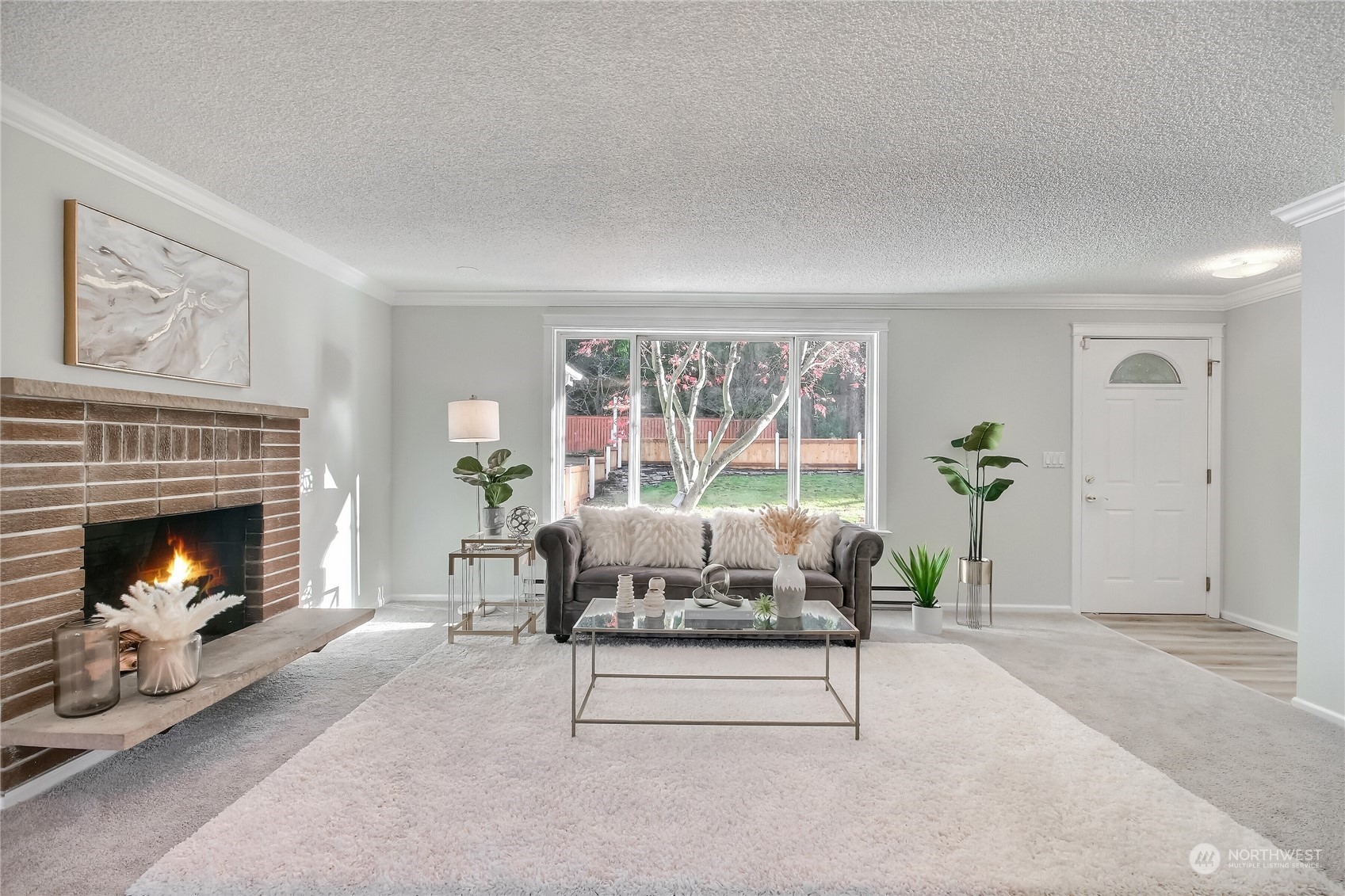 19818 34th Drive Southeast Bothell, WA 98012 - Photo 7 of 34 a living room with furniture and a fireplace