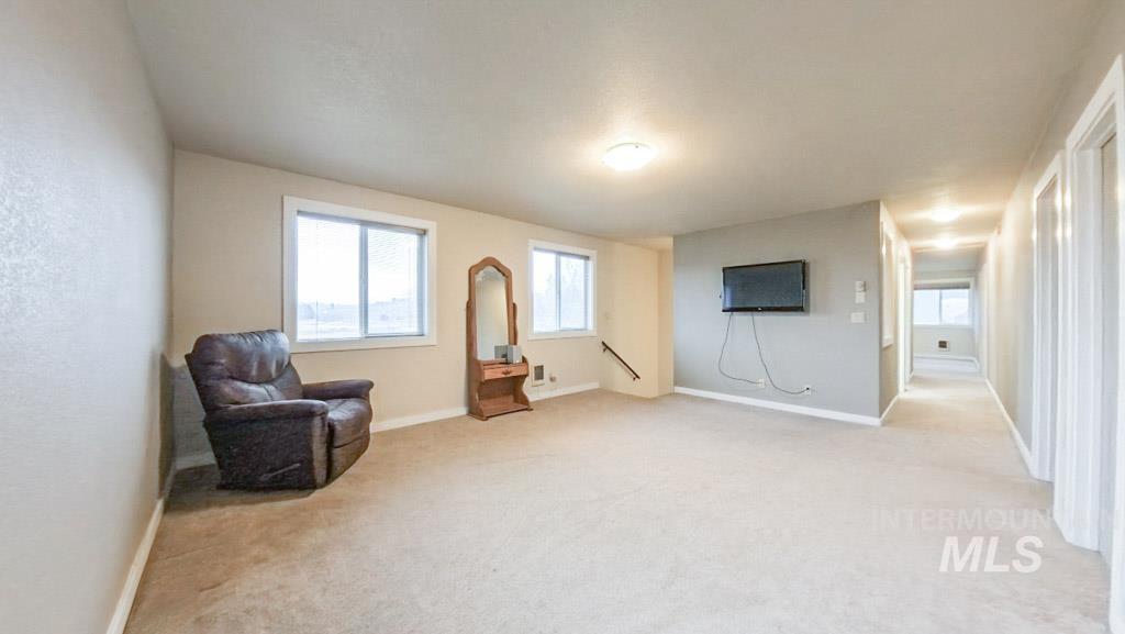 1277 Kennedy Ford Road Potlatch, ID 83855 - Photo 26 of 49 Lots of natural light! Rec, reading, or movie room! This is the first of the two rec rooms on the upper level. Both of these rooms await your vision!