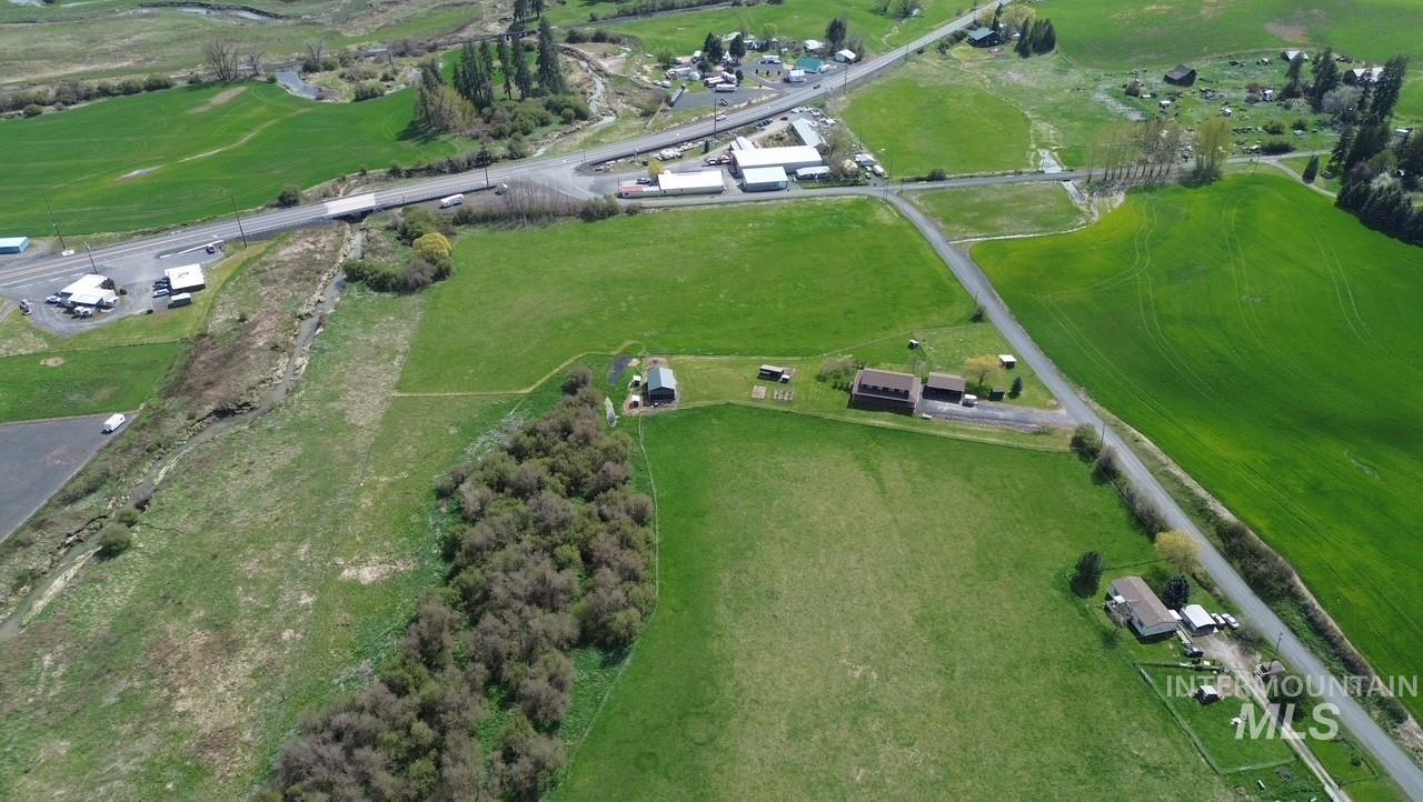 1277 Kennedy Ford Road Potlatch, ID 83855 - Photo 44 of 48 Expansive green fields surrounding multiple structures and paved roads