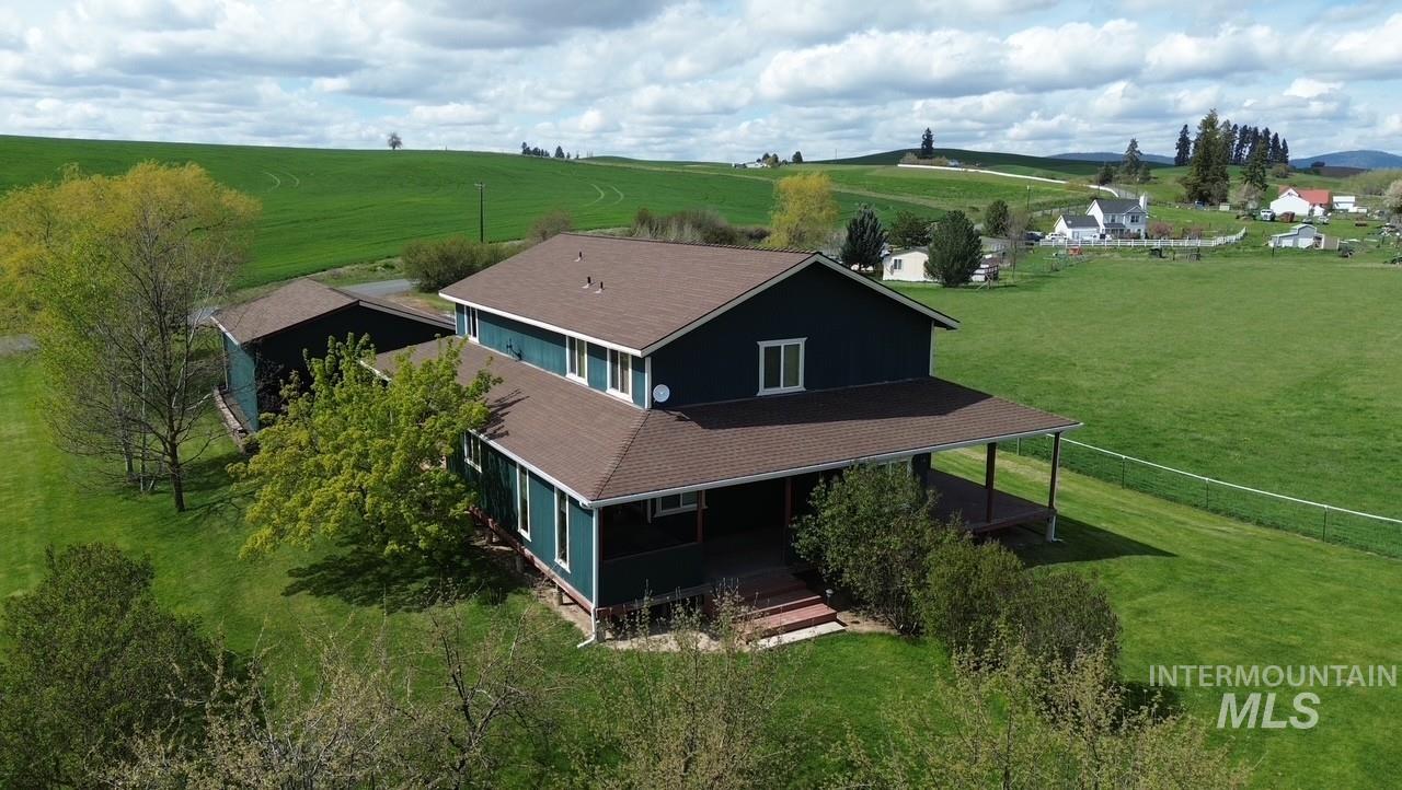1277 Kennedy Ford Road Potlatch, ID 83855 - Photo 47 of 48 Two-story residence featuring a dark blue exterior siding and a brown shingle roof