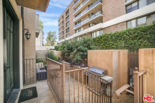 a view of a building from a balcony