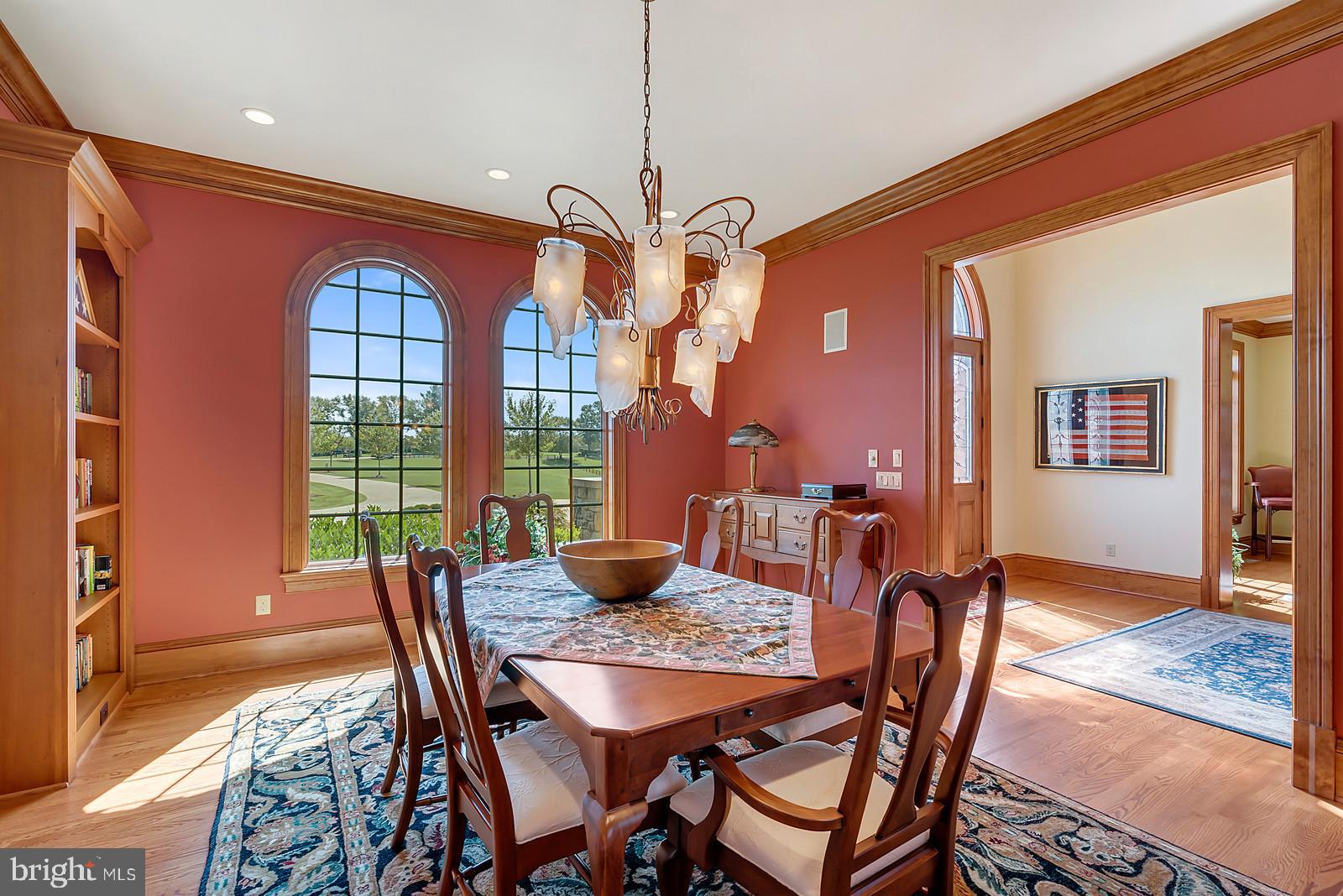 13036 Old Stillhouse Road Boston, VA 22713 - Photo 11 of 75 a dining room with furniture a chandelier and wooden floor