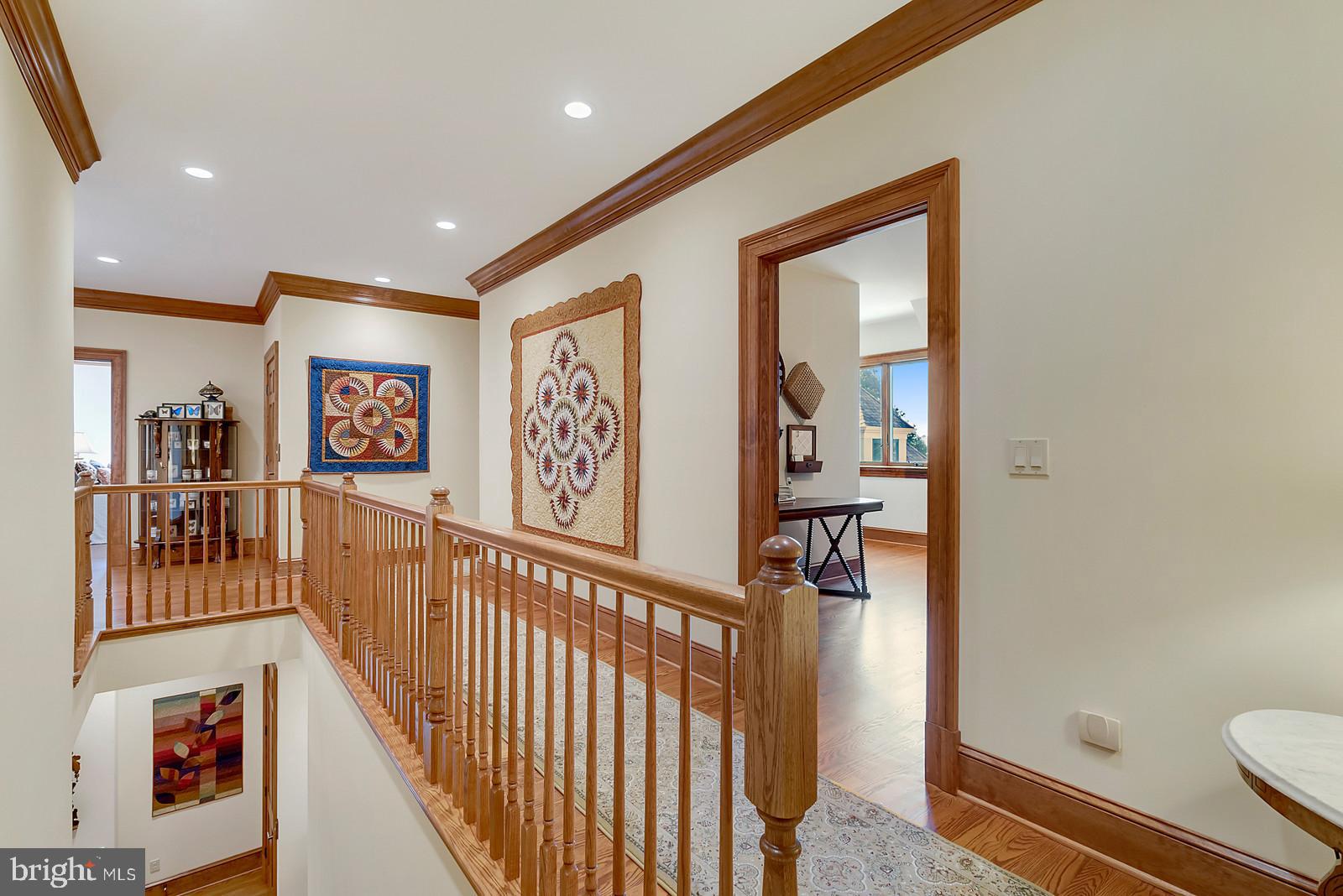 13036 Old Stillhouse Road Boston, VA 22713 - Photo 21 of 75 a view of a hallway with paintings on the wall