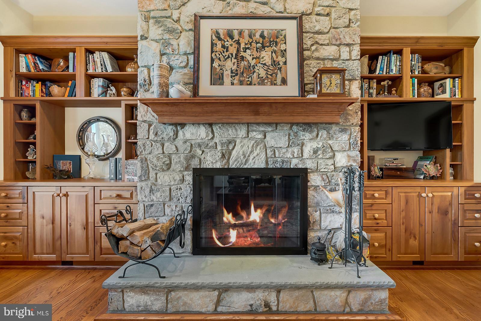 13036 Old Stillhouse Road Boston, VA 22713 - Photo 4 of 75 a living room with fireplace and a wooden floor