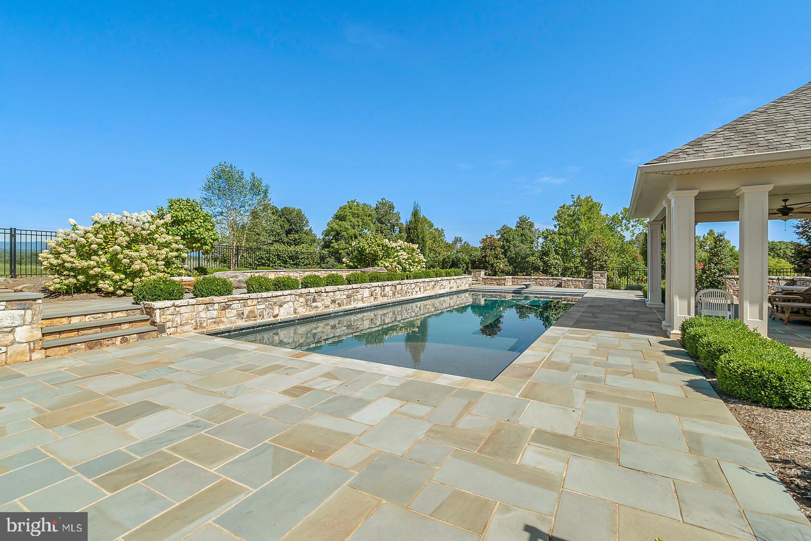 13036 Old Stillhouse Road Boston, VA 22713 - Photo 38 of 75 a view of a swimming pool with an outdoor seating