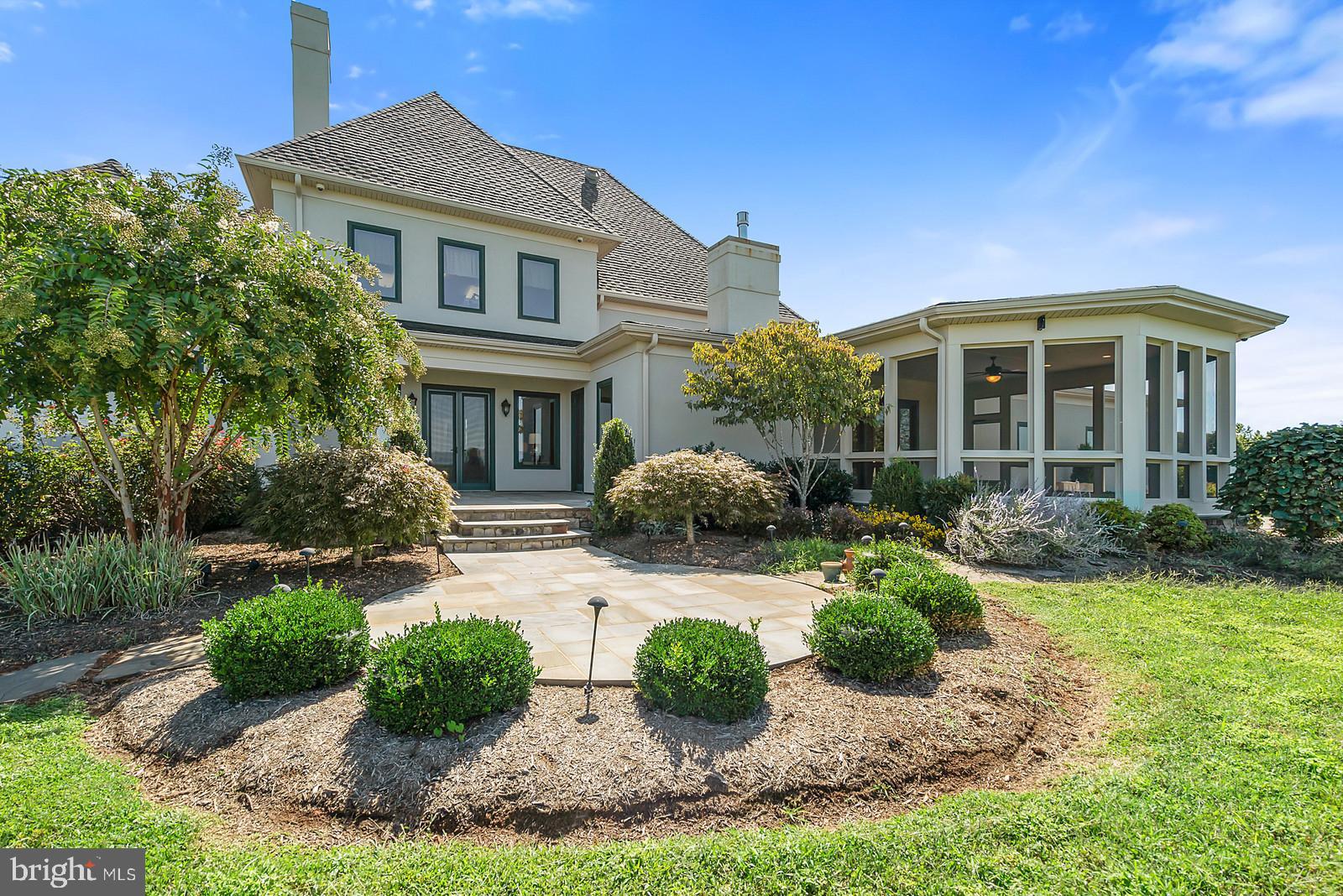 13036 Old Stillhouse Road Boston, VA 22713 - Photo 40 of 75 a front view of a house with garden and porch