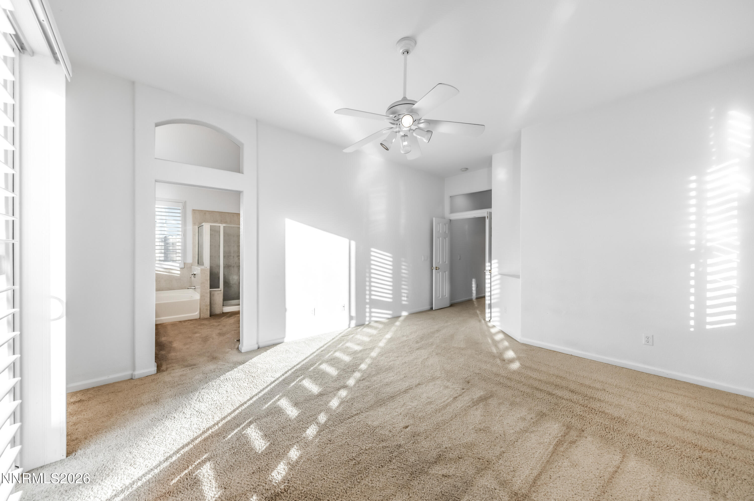 10145 Lucente Way Reno, NV 89521 - Photo 25 of 54 a view of an empty room with a window