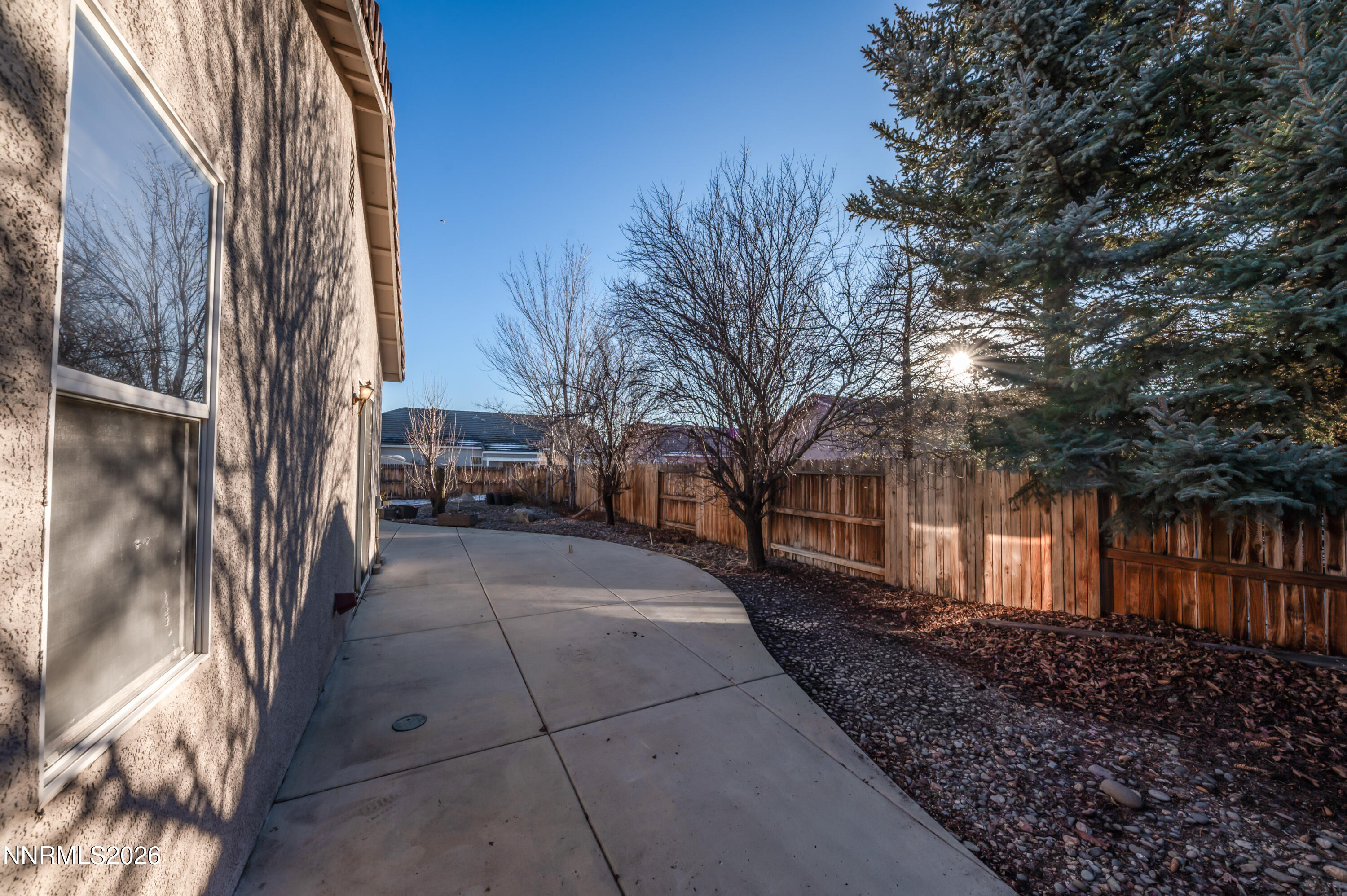 10145 Lucente Way Reno, NV 89521 - Photo 43 of 54 a view of a pathway with a house