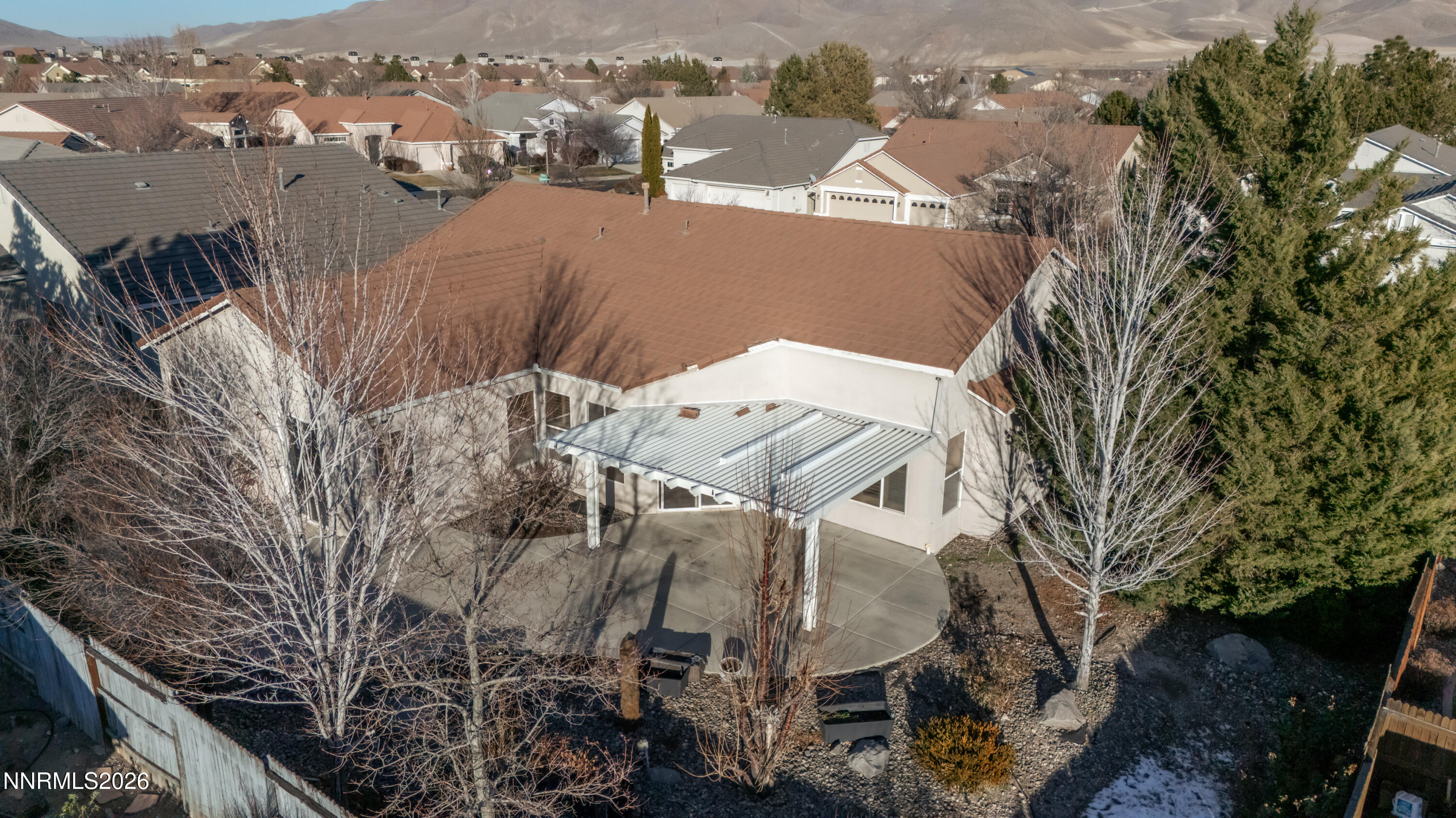 10145 Lucente Way Reno, NV 89521 - Photo 49 of 54 a view of a house with a yard