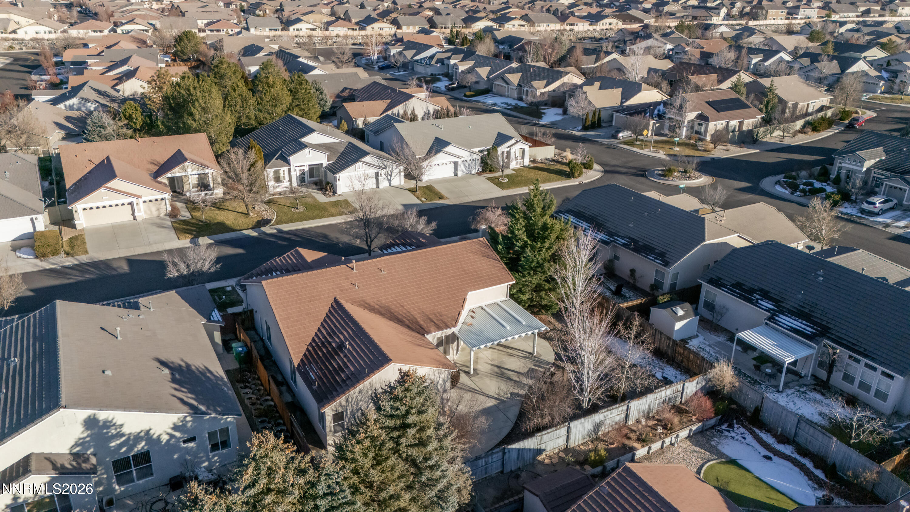 10145 Lucente Way Reno, NV 89521 - Photo 52 of 54 an aerial view of multiple houses with yard