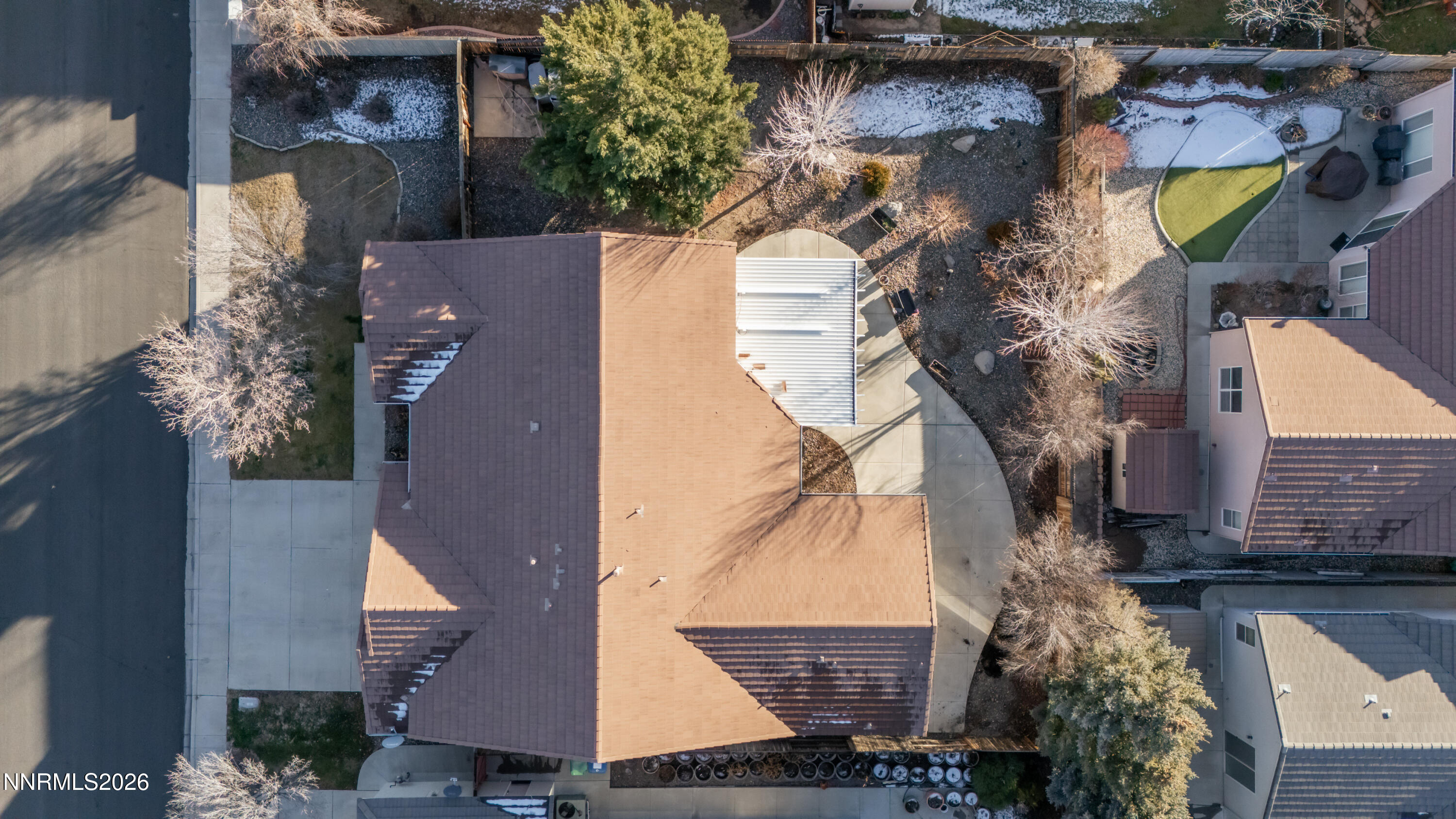 10145 Lucente Way Reno, NV 89521 - Photo 54 of 54 an aerial view of a house with a yard and lake view