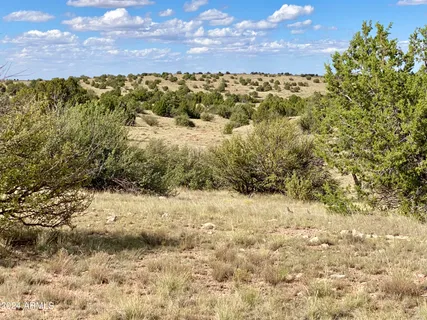 a view of beach and mountain